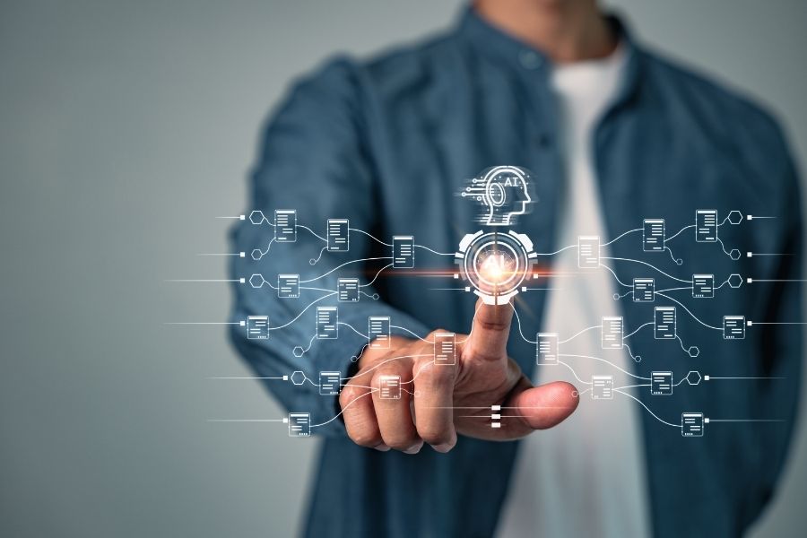 A man pointing at a glowing digital diagram displaying tech giants AI investments.
